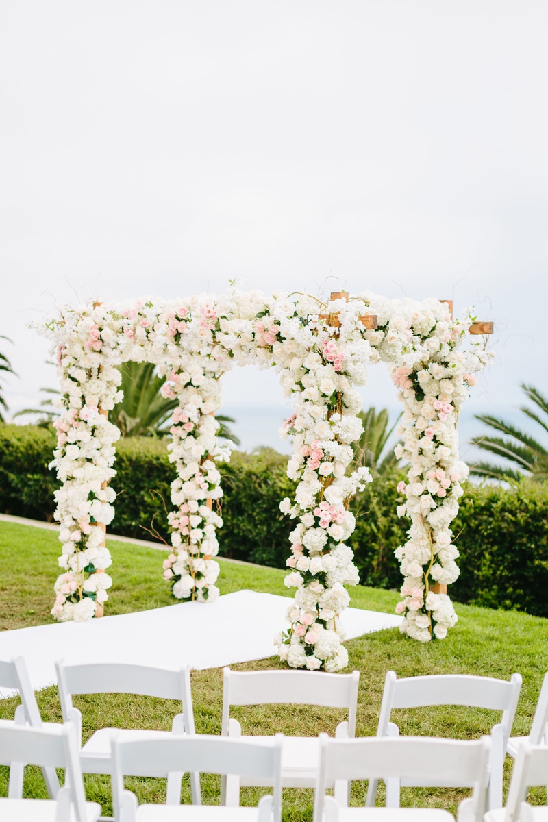 Ivory and Pink Florals on Chuppah
Photography: Jodee Debes Photography
Read More:
http://www.insideweddings.com/weddings/elegant-alfresco-ceremony-reception-with-parisian-elements/1176/ bel air bay club wedding, outdoor wedding ceremony on lawn, chuppah covered in flowers