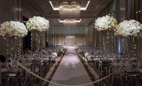 Ivory Flowers at Chicago Ballroom Ceremony
Photography: Studio This Is
Read More:
http://www.insideweddings.com/weddings/glamorous-city-style-real-wedding-at-a-luxury-hotel-in-chicago/1217/ chicago ballroom ceremony venue chandeliers white flowers orchids roses hydrangea round back chairs