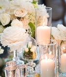 Roses, Mercury Votives, and Candles
Photography: KLK Photography
Read More:
http://www.insideweddings.com/weddings/nature-inspired-alfresco-ceremony-tent-reception-at-malibu-ranch/811/ centerpieces with candles in hurricanes, mercury votes mirror table reception