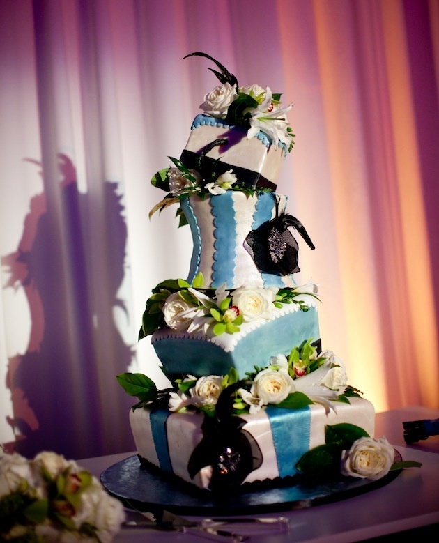 Whimsical Wedding Cake
Photography: Jessica Lewis Photography
Read More:
http://www.insideweddings.com/weddings/summer-wedding-at-the-sls-hotel-beverly-hills-california/460/ Blue and white tiltilng cake with black flowers