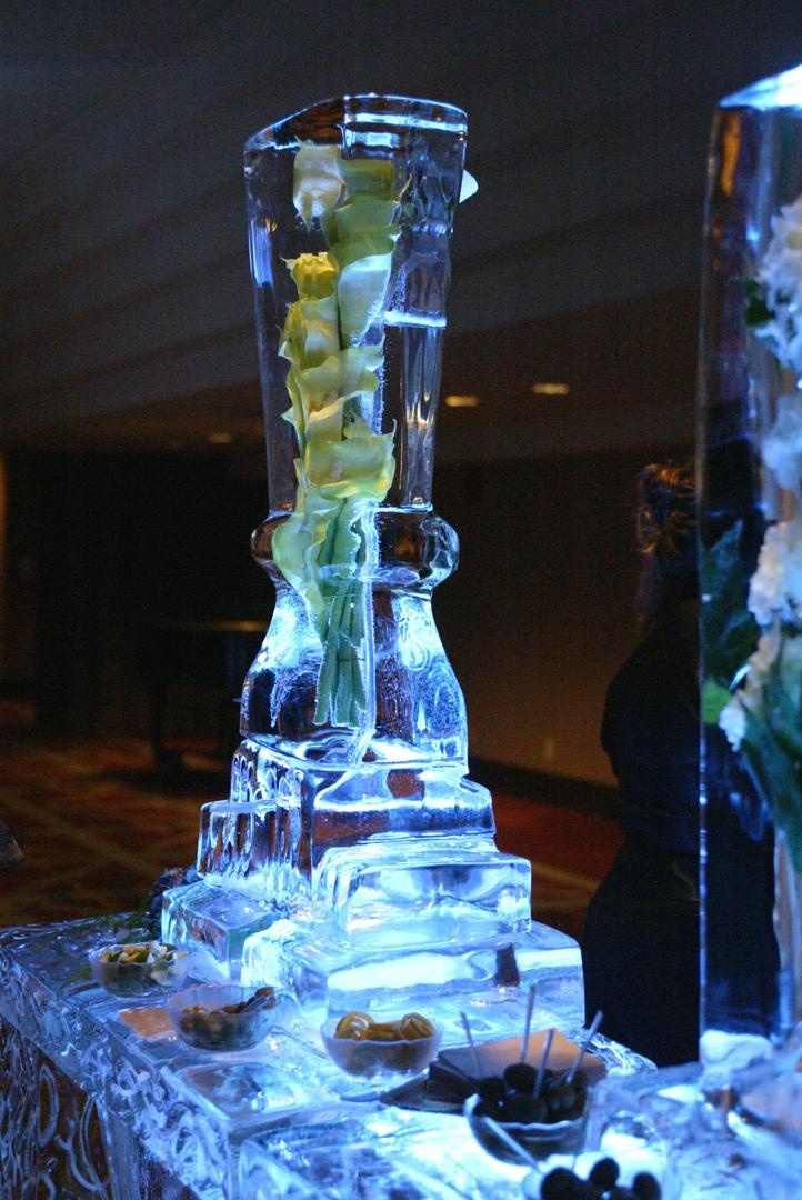 Ice Martini Bar
Photography: Lyn Sims Photographer
Read More:
http://www.insideweddings.com/weddings/glamorous-fall-wedding-with-garden-touches-in-tucson-arizona/258/ Calla lilies submerged in ice sculpture