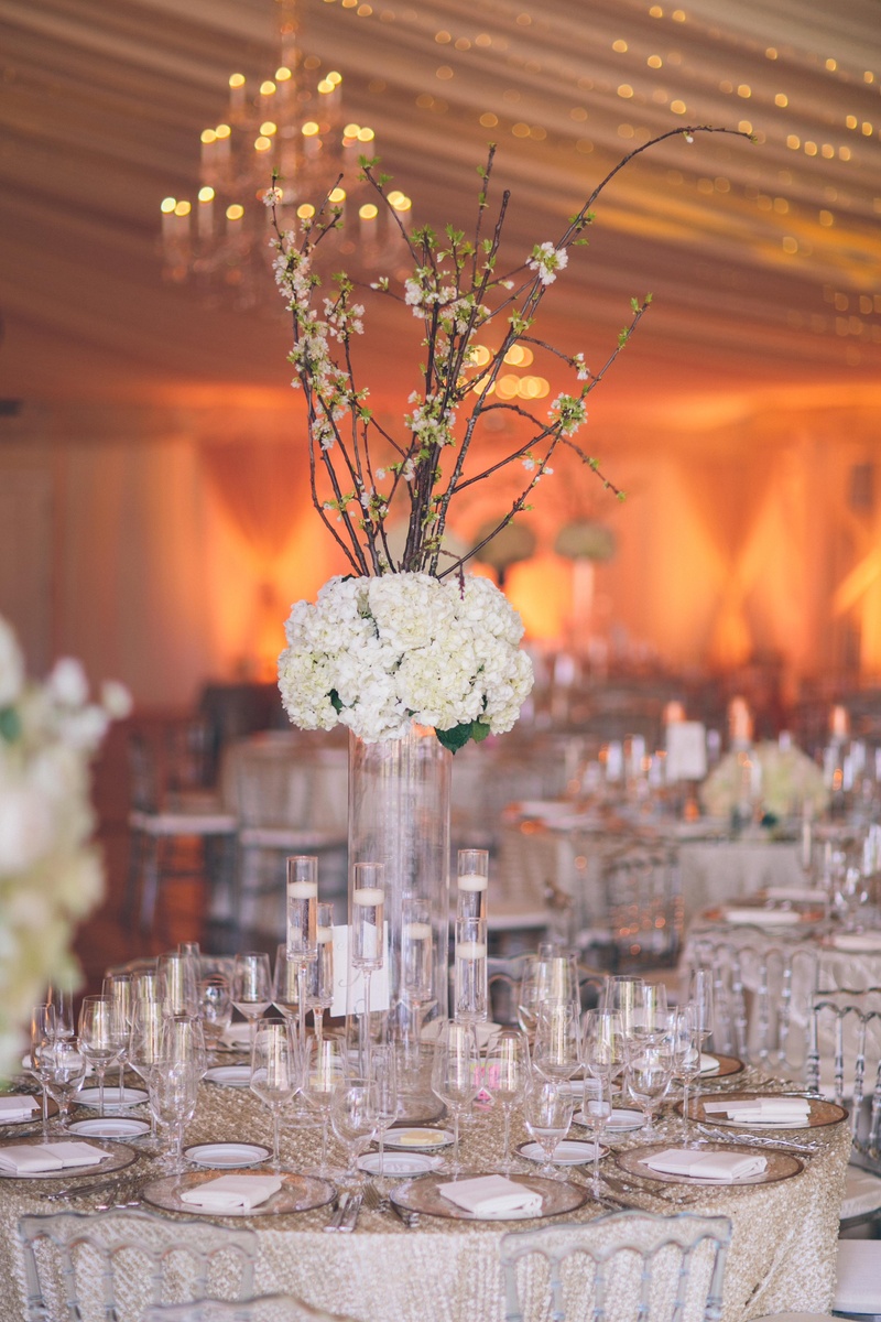 Unique Floral Centerpiece
Photography: David %26 Tammy Molnar
Read More:
http://www.insideweddings.com/weddings/an-exquisite-backyard-wedding-in-tennessee/532/ Sequined linens topped with floating candles