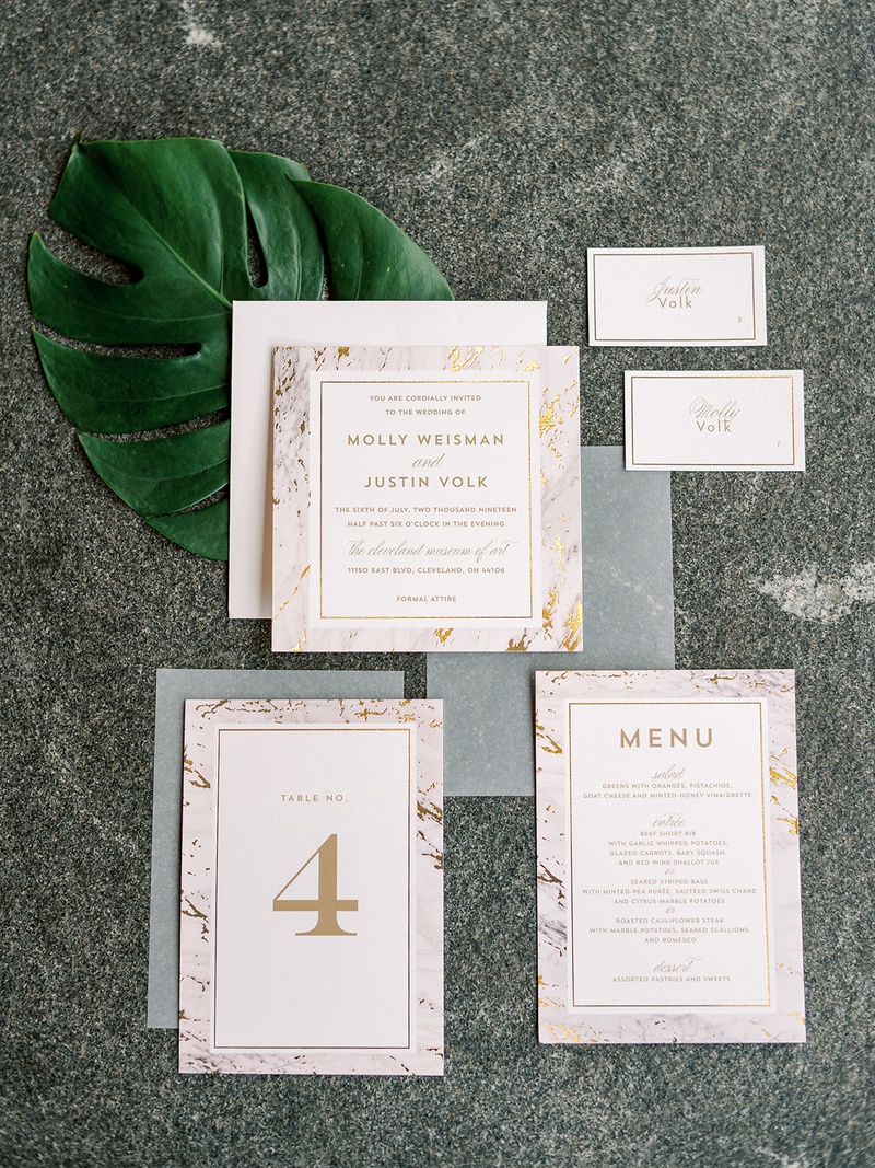 Gold Marble Design for Paper Goods
Photography: Lauren Gabrielle Photography
Read More:
http://www.insideweddings.com/weddings/summer-real-wedding-featuring-tropical-decor-at-an-art-museum/1328/ minted wedding invitation table number menu and escort cards marble gold design modern
