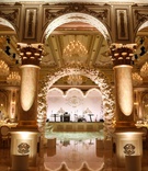 Archway Into Ballroom Reception
Photography: Alain Martinez Photography
Read More:
http://www.insideweddings.com/weddings/opulent-luxury-wedding-with-white-gold-color-scheme-in-palm-beach/1375/ wedding reception arch live band stage dance floor gold details white flowers