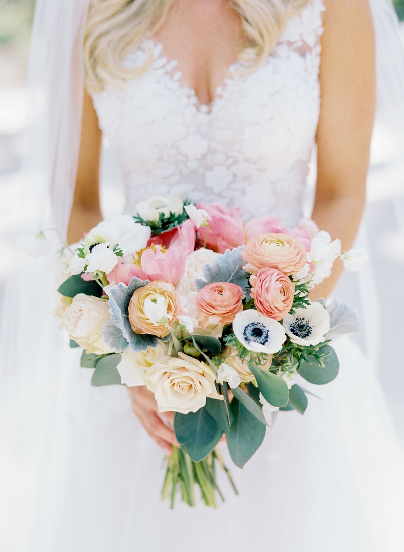 Bouquet Honoring Late Father
Photography: Vitor Lindo Photo + Video
Read More:
http://www.insideweddings.com/weddings/soft-romantic-spring-destination-wedding-in-south-carolina/1285/ bride in mark ingram atelier wedding dress with bouquet peach pink orange blue green flower anemone