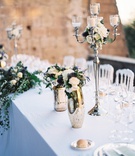 Mercury Glass Vases with Flowers
Photography: Rochelle Cheever
Read More:
http://www.insideweddings.com/weddings/charming-romantic-outdoor-destination-wedding-in-italy/1316/ outdoor destination wedding silver candelabra mercury glass vase thistle white rose dahlia flowers