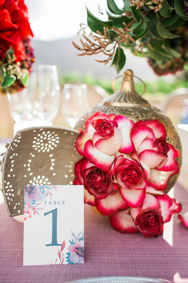 Gold Lantern with Red-and-White Roses
Photography: Jenny Quicksall Photography
Read More:
http://www.insideweddings.com/weddings/romantic-wedding-shoot-for-valentines-day-at-california-vineyard/751/ watercolor invitations pink table linens gold lanterns red and white flowers vineyard glasses