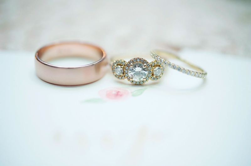 Three-Stone Halo Engagement Ring
Photography: Kortnee Kate Photography
Read More:
http://www.insideweddings.com/weddings/hometown-celebration-with-rustic-details-colorful-pastel-flowers/1035/ Wedding ring rose gold men's band and pave yellow gold women's band with three stone engagement ring
