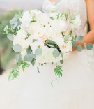 Light-Colored Bouquet with Greenery
Photography: Love %26 You Studios
Read More:
http://www.insideweddings.com/weddings/destination-wedding-with-unique-personalized-elements-in-malibu/1079/ Bouquet with silver dollar eucalyptus white flowers dahlia rose light blush blooms peony greenery