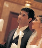 Bride and Groom at Greek Wedding Ceremony
Photography: Joe Buissink Photography
Read More:
http://www.insideweddings.com/weddings/fall-greek-orthodox-wedding-ceremony-in-los-angeles-california/127/ Bride and groom hold candles during Greek wedding ceremony