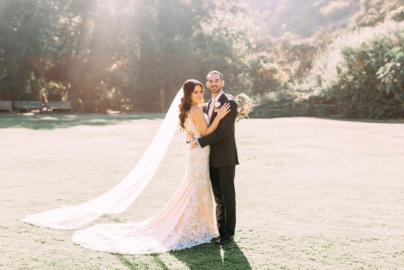 Sunlit Wedding Portrait at Ranch
Photography: Ashley Paige Photography
Read More:
http://www.insideweddings.com/weddings/elegant-outdoor-fall-wedding-at-a-rustic-chic-venue-in-malibu/1244/ bride and groom at calamigos ranch wedding venue in malibu calla blanche wedding dress veil sunlight