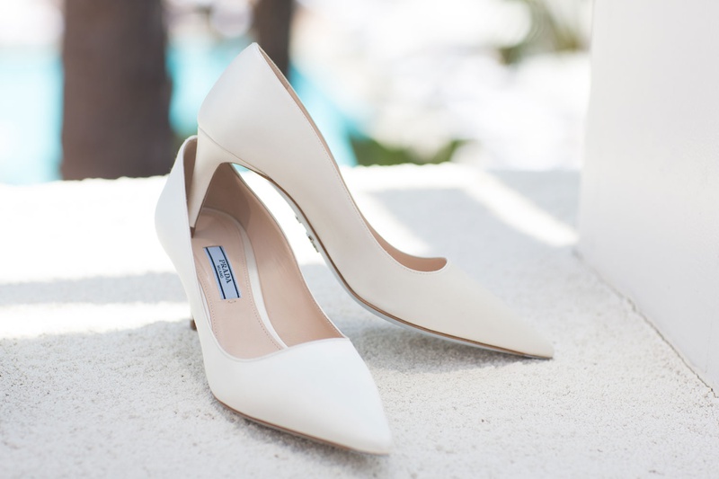 White Pumps for Wedding Day
Photography: Jay Lawrence Goldman Photography
Read More:
http://www.insideweddings.com/weddings/outdoor-ceremony-ballroom-reception-with-pink-flowers-greenery/1135/ Simple wedding shoes prada pumps white bridal heels
