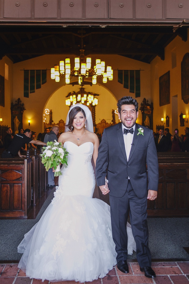 Joyous Wedding Couple
Photography: Jasmine Star Photography
Read More:
http://www.insideweddings.com/weddings/spanish-style-ceremony-outdoor-ranch-wedding-reception/504/ Bride and groom ecstatic as they leave church ceremony