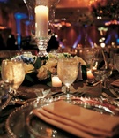 Candlelit Place Setting
Photography: Angela R. Talley Studio
Read More:
http://www.insideweddings.com/weddings/a-classic-southern-wedding-in-nashville/233/ Ballroom reception with candlelight and beaded charger plate