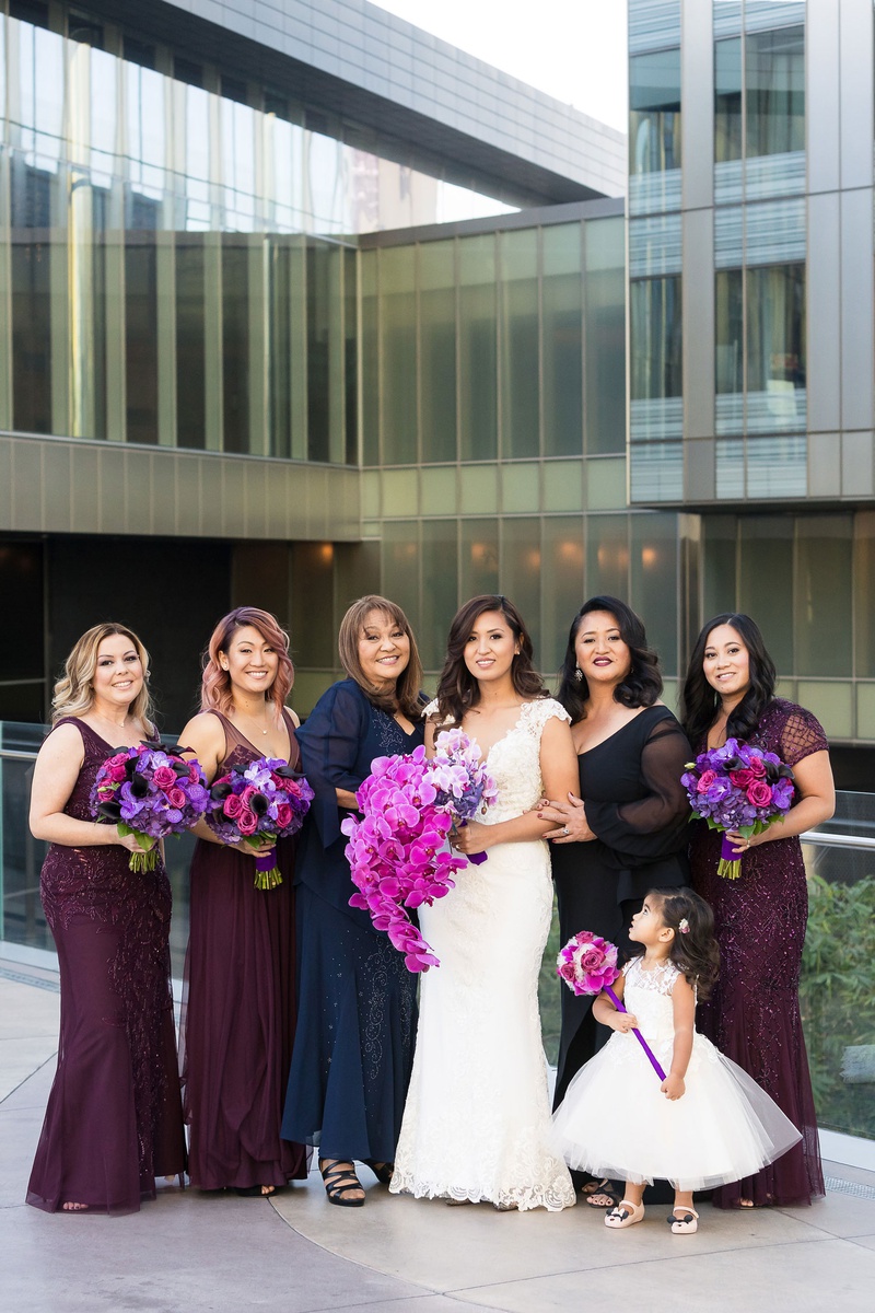 Bride with Female Loved Ones
Photography: Brian Leahy Photography
Read More:
http://www.insideweddings.com/weddings/a-hawaiian-couples-luxurious-destination-wedding-in-las-vegas/1226/ bride in cristiano lucci wedding dress, bridesmaids in plum dresses, mother of the bride, flower gir