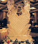 Heart-Shaped Ice Sculpture
Photography: Yvette Roman Photography
Read More:
http://www.insideweddings.com/weddings/sophisticated-black-white-wedding-in-santa-barbara-california/113/ Ice sculpture with birds and heart at wedding reception