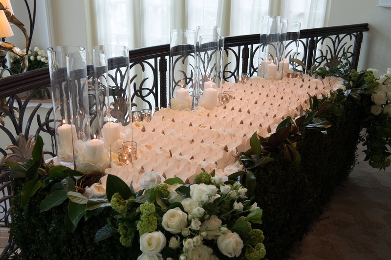 Glass Hurricanes on Escort Card Table
Photography: John Solano Photography
Read More:
http://www.insideweddings.com/weddings/an-opulent-garden-ceremony-ballroom-reception-in-beverly-hills/986/ Wedding reception table escort cards white flowers greenery candles in cylinder vases ivory escort