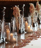 Romantic Pew Decorations
Photography: Paul Barnett Photographer
Read More:
http://www.insideweddings.com/weddings/pink-black-wedding-at-the-grand-del-mar-in-san-diego-california/379/ Pillar candles and flowers next to wooden pews