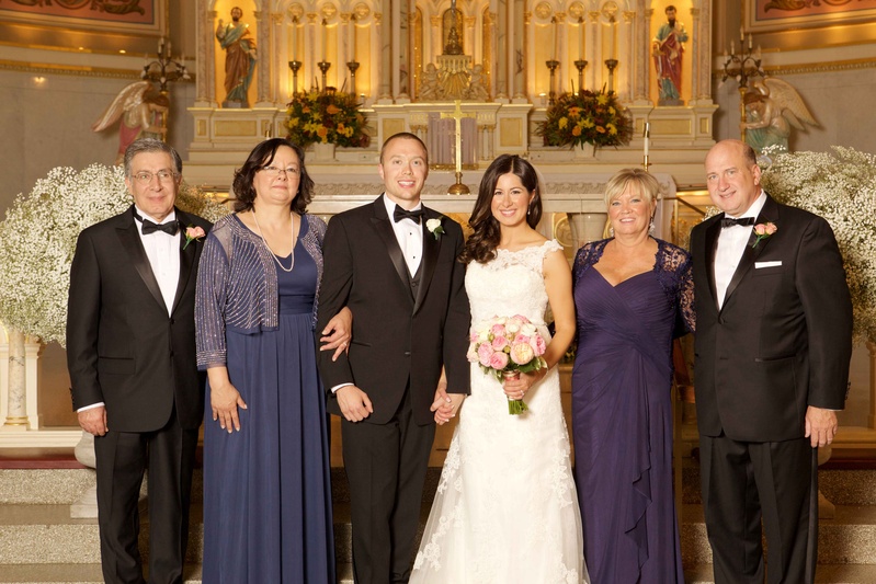 Coordinating Mothers of the Bride %26 Groom
Photography: Amanda Sudimack for Artisan Events
Read More:
http://www.insideweddings.com/weddings/customized-chicago-wedding-with-pink-blush-marsala-color-palette/911/ Bride and groom at front of church with family fathers in tuxedos and mothers in purple hued gowns