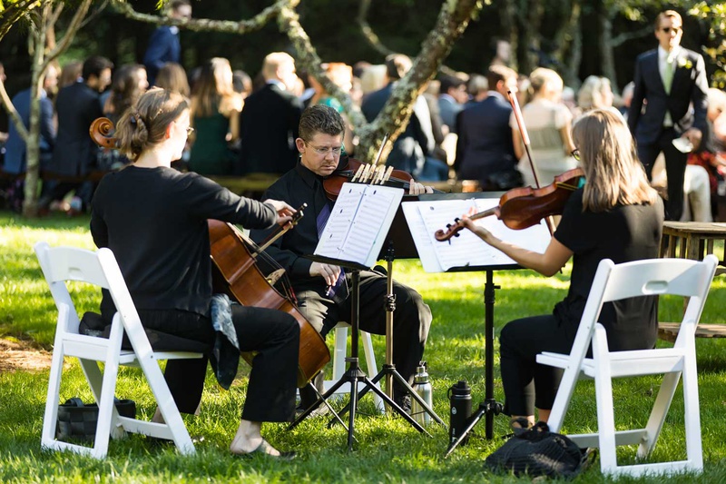 String Musicians at Outdoor Ceremony
Photography: Vue Photography
Read More:
http://www.insideweddings.com/weddings/destination-rustic-fall-wedding-at-a-farm-in-north-carolina/1202/ wedding ceremony musicians violin cello viola in white chairs on lawn greenery