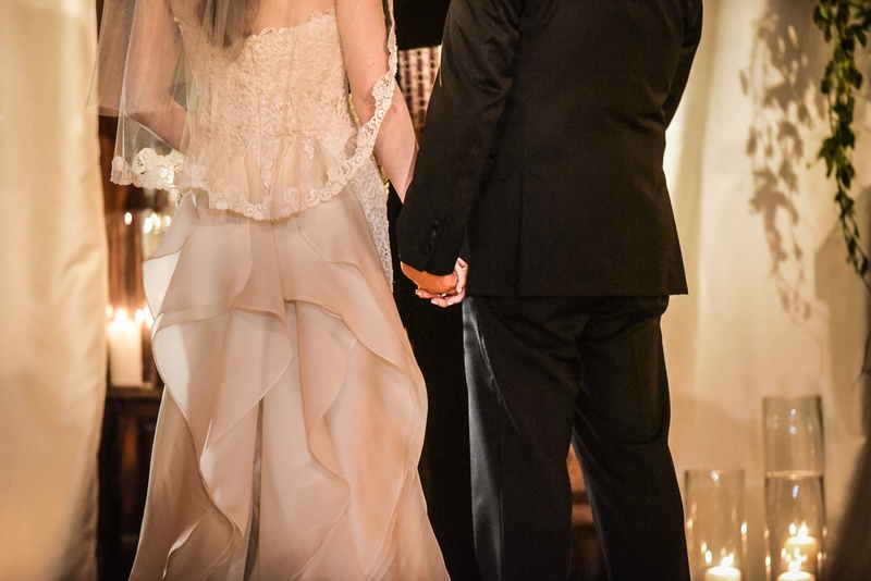 Bride and Groom Holds Hands During Ceremony
Photography: Joe Photo
Read More:
http://www.insideweddings.com/weddings/the-unique-and-intimate-wedding-of-trains-bassist-hector-maldonado/879/ bride in oscar de la renta, groom in tommy hilfiger hold hands during ceremony