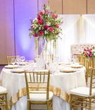 Tall, Colorful Centerpiece
Photography: Fully Alive Photography
Read More:
http://www.insideweddings.com/weddings/cultural-inspirational-wedding-with-vibrant-colors-in-arizona/1147/ south asian wedding inspiration,red, magenta, purple, greenery floral centerpiece