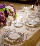 Silver-Rimmed Place Setting
Photography: Walters %26 Walters
Read More:
http://www.insideweddings.com/weddings/classic-country-club-wedding-in-north-carolina/423/ Sequined linens with beaded charger plates and china