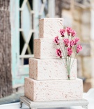 Four-Tiered Square Cake
Photography: Rebecca Cerasani
Read More:
http://www.insideweddings.com/weddings/fairy-tale-romance-inspiration-with-abundance-of-bright-florals/1356/ four-layer texture cake design with square tiers pink flowers and texture design