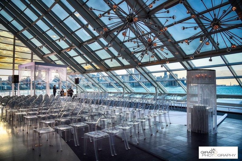 Photography: Jai Girard Photography
Read More:
http://www.insideweddings.com/biz/hmr-designs-chicago/8664/ Lakefront view making beautiful the clear, glass ceremony decor.