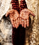 Indian Bridal Mehndi
Photography: Jai Girard Photography
Read More:
http://www.insideweddings.com/weddings/incredible-indian-wedding-celebration-in-chicago-illinois/516/ Bride wearing wedding rings with henna on hands