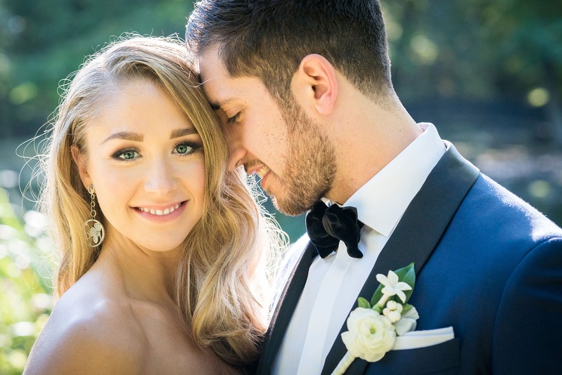 Groom Smiling at Bride
Photography: Robert Evans for 5th Avenue Digital
Read More:
http://www.insideweddings.com/weddings/outdoor-jewish-wedding-ceremony-at-stunning-chateau-in-new-jersey/1058/ Groom in navy tuxedo black lapel bow tie white ranunculus boutonniere stephanotis blossom
