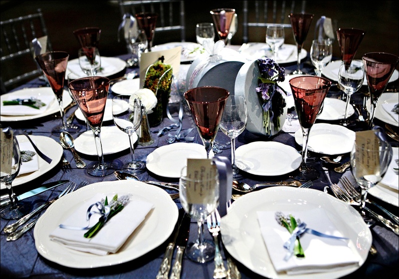 Reception Place Settings
Photography: Marie Labbancz Photography
Read More:
http://www.insideweddings.com/weddings/elegant-spring-wedding-at-the-pennsylvania-academy-of-the-fine-arts/176/ Wedding reception table with blue tablecloth, white tableware, and red glassware