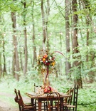 Dinner Table in the Forest
Photography: Veronica Varos Photography
Read More:
http://www.insideweddings.com/weddings/a-bohemian-inspired-wedding-shoot-in-an-enchanted-forest/643/ Wedding reception country table surrounded by mismatched wooden chairs on an oriental rug