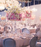 Pink, Ivory, and Silver Reception
Photography: John %26 Joseph Photography
Read More:
http://www.insideweddings.com/weddings/opulent-same-sex-wedding-ceremony-reception-in-san-diego-ca/995/ Wedding reception white drapery pink linen flower centerpieces silver chairs tall flower chandelier