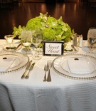 White %26 Green Sweetheart Table
Photography: KingenSmith
Read More:
http://www.insideweddings.com/weddings/chicago-private-club-wedding-with-whimsical-details/282/ Half circle table with white tablecloth and green flowers