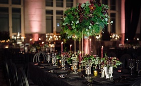 Dark-Hued Reception Tablescape
Photography: Erika Delgado Photography
Read More:
http://www.insideweddings.com/weddings/unique-wedding-with-greenery-black-and-oxblood-decor-in-miami/1091/ Reception with dark velvet linens, black charger, black napkin, black chair, tall centerpiece