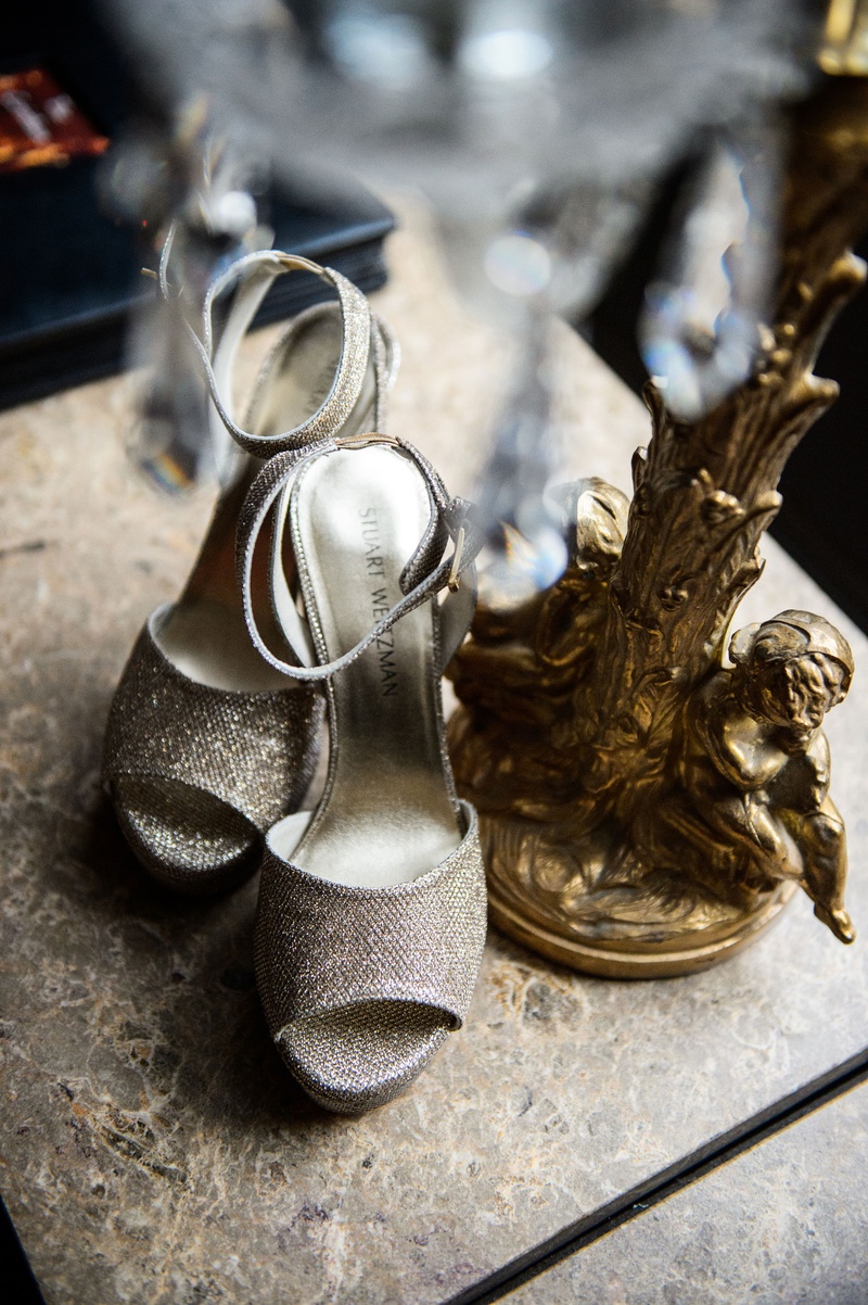 Sparkling Peep-Toe Shoes with Ankle Strap
Photography: Chris Bailey Photography
Read More:
http://www.insideweddings.com/weddings/modern-elegant-ballroom-wedding-with-white-flowers-in-houston/1246/ Stuart Weitzman sparkle shimmer shoes ankle strap peep toe large toe strap high heels
