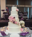 Six-Layer Cake with Fresh Flowers
Photography: Carasco Photography
Read More:
http://www.insideweddings.com/weddings/traditional-ceremony-ballroom-reception-in-downtown-chicago/1197/ wedding cake with love calligraphy topper diagonal stripe frosting pink peony garden rose flowers