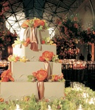 Wedding Cake
Photography: Michelle Walker Photography
Read More:
http://www.insideweddings.com/weddings/vibrant-fall-celebration-at-the-san-francisco-ferry-building/161/ Four-tiered wedding cake with roses, orchids, and ribbons
