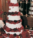 White %26 Red Wedding Cake
Photography: Dalal Photography
Read More:
http://www.insideweddings.com/weddings/winter-wedding-at-the-jonathan-club-in-santa-monica-california/7/ Classic white wedding cake with red floral tiers
