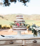3-Tiered Naked Cake with Fresh Flowers
Photography: Katie Shuler Photography
Read More:
http://www.insideweddings.com/weddings/rustic-chic-outdoor-wedding-at-a-winery-in-northern-california/945/ 3 three tier naked wedding cake fresh flowers pink blue purple green natural