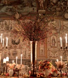 Tall Vase of Blossoming Branches
Photography: Facibeni Fotografia
Read More:
http://www.insideweddings.com/weddings/anniversary-dinner-in-florence-inspired-by-still-life-paintings/1266/ renaissance inspired tablescape in palace in florence, large silver vase, red blossoming branches