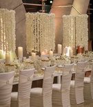 Chandelier of Flower Petals
Photography: Karlisch Photography %26 f8studio
Read More:
http://www.insideweddings.com/weddings/glamorous-new-years-eve-wedding-at-a-science-museum-in-dallas/960/ chandelier of flower petals on strings, ruched white chair covers