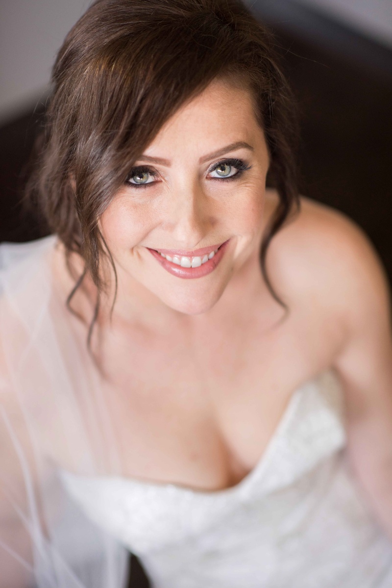 Bride Smiles Up at Camera
Photography: Laurie Bailey Photography
Read More:
http://www.insideweddings.com/weddings/classic-california-wedding-with-outdoor-ceremony-indoor-reception/853/ bride smiles up camera makeup beauty pink lips bridal eyeliner mascara black veil sweetheart