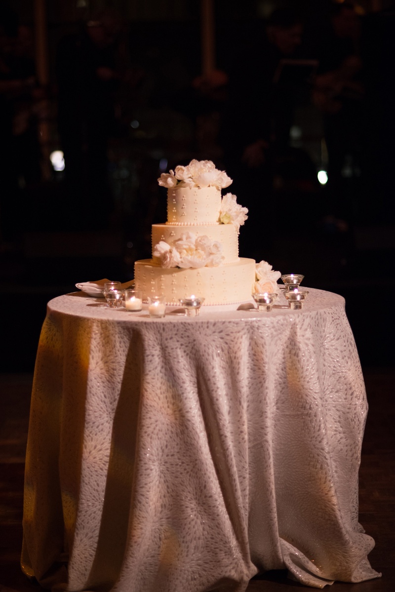 White Three Tier Cake with Flowers
Photography: Ira Lippke Studios
Read More:
http://www.insideweddings.com/weddings/chic-classic-new-york-city-wedding-with-personal-touches/783/ white three tier cake featuring blush flowers surrounded by small candles