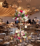White and Pink Floral Arrangement in Tall Silver Vase
Photography: Sheri Whitko
Read More:
http://www.insideweddings.com/weddings/jewish-wedding-with-personal-details-and-a-whimsical-garden-motif/808/ peonies roses hydrangeas tall centerpiece romantic candles tablescape