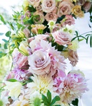 Bright Flowers and Foliage on Chuppah
Photography: Callaway Gable
Read More:
http://www.insideweddings.com/weddings/alfresco-summer-wedding-with-lush-foliage-accents-in-california/805/ flowers in shades of blush, ivory, and off-white with greenery clinging to couples outdoor chuppah