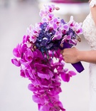 Cascading Purple Orchids
Photography: Brian Leahy Photography
Read More:
http://www.insideweddings.com/weddings/a-hawaiian-couples-luxurious-destination-wedding-in-las-vegas/1226/ cascading orchid bouquet in shades of purple, violet, fuchsia