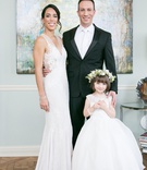 Bride with Groom and His Daughter
Photography: L Photographie
Read More:
http://www.insideweddings.com/weddings/church-ceremony-elegant-reception-with-silver-details/1127/ bride in rivini wedding dress, groom in tux and white neck tie, flower girl in full ball gown