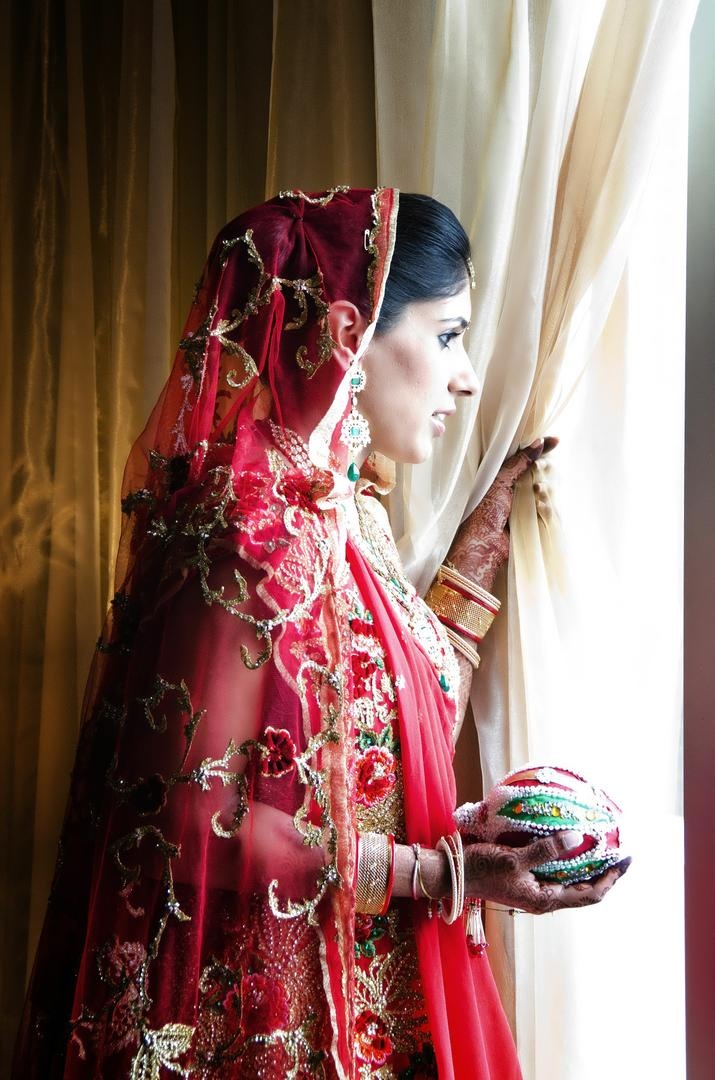 Red Veil
Photography: Tomas Ramos Photographers
Read More:
http://www.insideweddings.com/weddings/houston-indian-wedding-celebration-with-800-person-guest-list/435/ Indian bride in a red lehenga with a red embroidered veil